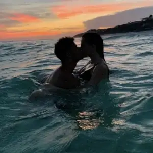 Couple in water at sunset | Pure Romance By Trish Couple in water at sunset